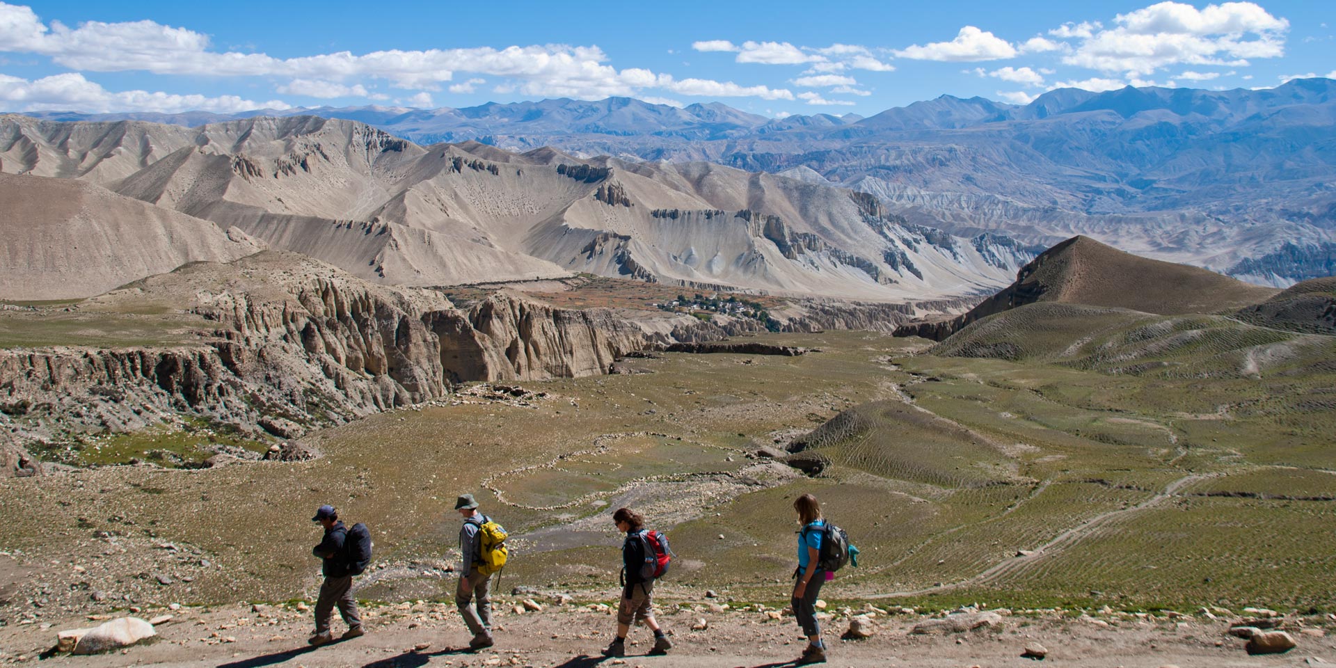 Trekkers on the trail from Drakmar to Lo Gekar in the Mustang region of Nepal