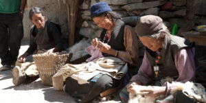 Woman in Dhi village doing their wool work in Mustang region of Nepal