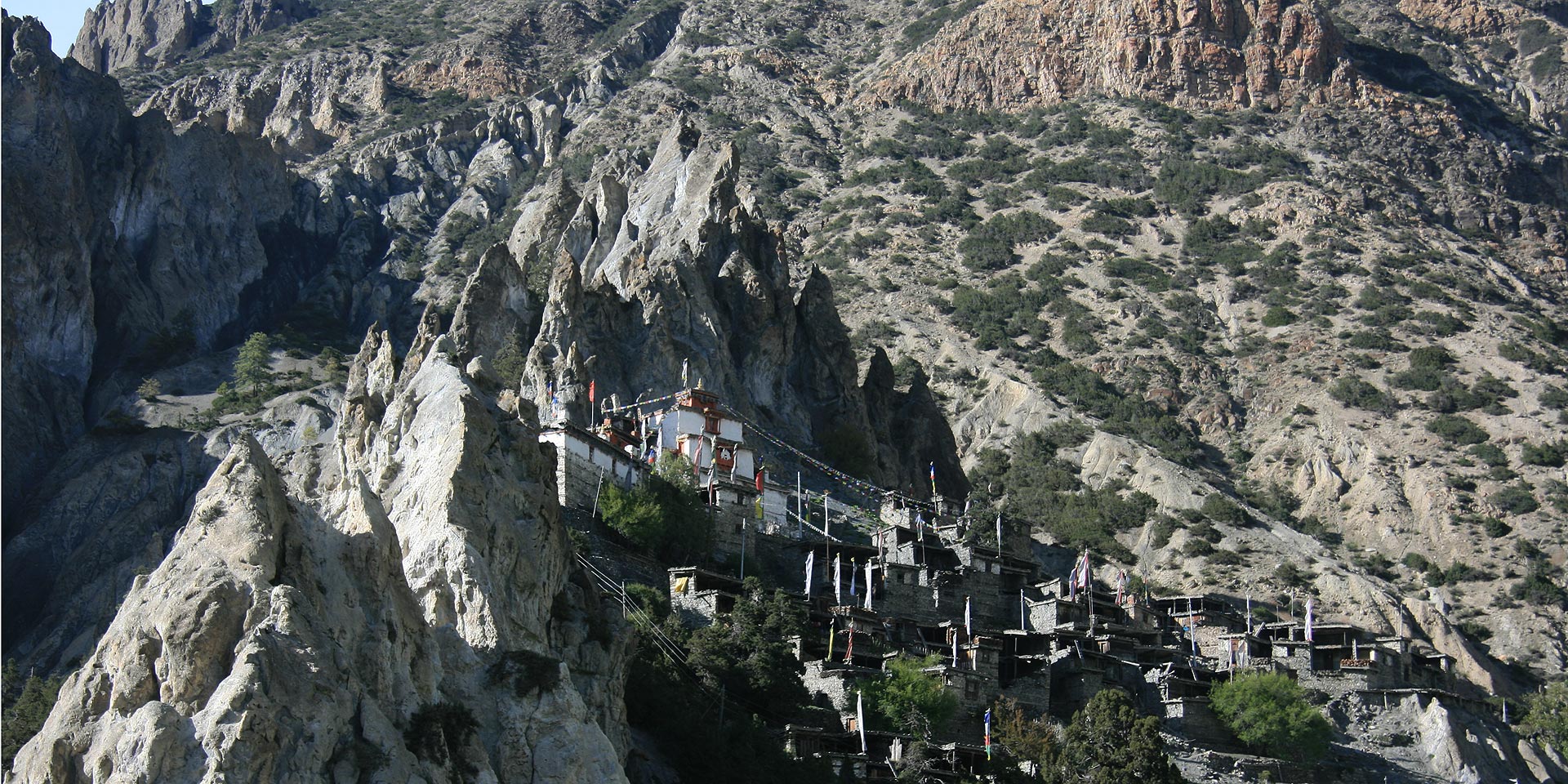 Trekkers descending from Kang La to Ngawal on the Annapurna Circuit