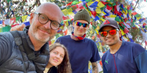 Guide with guests at Namobuddha monastery on the Balthali trek in Nepal