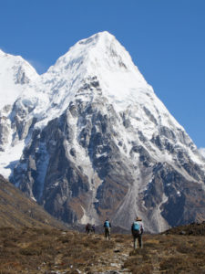 Trekkers on the way to Oktang (Kanchenjunga South BC) with Rathong in the background