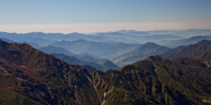 Looking south over the middle hill from Sinelapse pass on the Kanchenjunga trek in Nepal